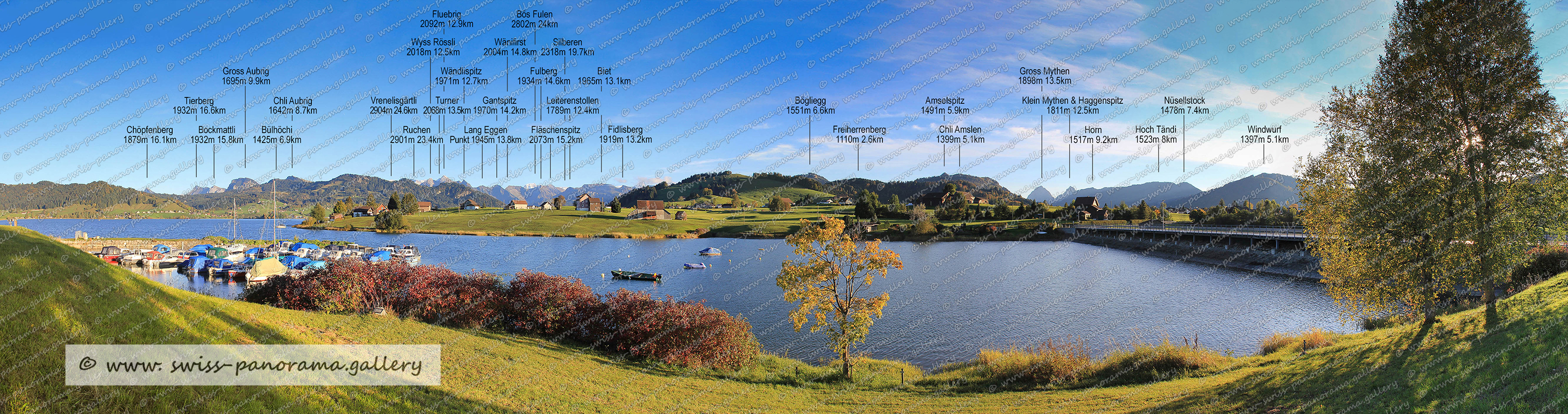 Beschriftetes Alpenpanorama vom Schwanderturm, Kanton Schwyz, Schweizer Alpenpanorama, labelled mountain panorames from Switzerland, Gross Aubrig 1695m 9.9km, Chli Aubrig 1642m 8.7km, Bülhöchi 1425m 6.9km, Wändlispitz 1971m 12.7km, Gipfel Vrenelisgärtli 2904m 24.6km, Glärnisch 2914m 24.2km, Fluebrig 2092m 12.9km, Wyss Rössli, Turner 2068m 13.5km, Ruchen 2901m 23.4km, Silberen 2318m 19.7km, Bös Fulen 2802m 24km, Fulberg 1934m 14.6km, Wänifirst 2004m 14.8km, Gantspitz 1970m 14.2km, Sattelchopf 1316m 5.5km, Lang Eggen Punkt 1945m 13.8km, Bockmattli 1932m 15.8km, Leiterenstollen 1789m 12.4km, Chöpfenberg 1879m 16.1km, Schlundwaldstock 1600m 11.1km, Fläschenspitz 2073m 15.2km, Tierberg 1932m 16.6km, Hoch Hund 2215m 16.6km, Biet 1965m 13.1km, Amselspitz 1491m 5.9km, Gross Mythen 1898m, Klein Mythen & Haggenspitz 1811m, Windwurf  1397m 5.1km, Nüsellstück 1478m 7.4km, Nüsellstück 1478m 7.4km, Horn 1517m 9.2km, Chli Amslen 1399m 5.1km, Freiherrenberg 1110 m, Bögliegg 1551m 6.6km, Druesberg 2282m 16.3km, Fidlisbach 1919m 13.2km, Schlundwaldstock 1600m 11.1km, swiss-panorama.galler, swiss panorama, Schweizer Bergpanorame, Swiss Alps, swiss panorama gallery, Natur Panorama Sihlsee, Schwyzer Alpenpanorama,