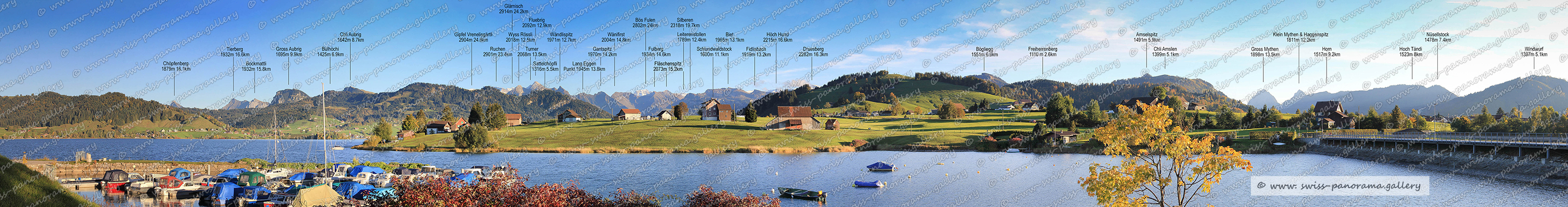 Beschriftetes Alpenpanorama vom Schwanderturm, Kanton Schwyz, Schweizer Alpenpanorama, labelled mountain panorames from Switzerland, Gross Aubrig 1695m 9.9km, Chli Aubrig 1642m 8.7km, Bülhöchi 1425m 6.9km, Wändlispitz 1971m 12.7km, Gipfel Vrenelisgärtli 2904m 24.6km, Glärnisch 2914m 24.2km, Fluebrig 2092m 12.9km, Wyss Rössli, Turner 2068m 13.5km, Ruchen 2901m 23.4km, Silberen 2318m 19.7km, Bös Fulen 2802m 24km, Fulberg 1934m 14.6km, Wänifirst 2004m 14.8km, Gantspitz 1970m 14.2km, Sattelchopf 1316m 5.5km, Lang Eggen Punkt 1945m 13.8km, Bockmattli 1932m 15.8km, Leiterenstollen 1789m 12.4km, Chöpfenberg 1879m 16.1km, Schlundwaldstock 1600m 11.1km, Fläschenspitz 2073m 15.2km, Tierberg 1932m 16.6km, Hoch Hund 2215m 16.6km, Biet 1965m 13.1km, Amselspitz 1491m 5.9km, Gross Mythen 1898m, Klein Mythen & Haggenspitz 1811m, Windwurf  1397m 5.1km, Nüsellstück 1478m 7.4km, Nüsellstück 1478m 7.4km, Horn 1517m 9.2km, Chli Amslen 1399m 5.1km, Freiherrenberg 1110 m, Bögliegg 1551m 6.6km, Druesberg 2282m 16.3km, Fidlisbach 1919m 13.2km, Schlundwaldstock 1600m 11.1km, swiss-panorama.galler, swiss panorama, Schweizer Bergpanorame, Swiss Alps, swiss panorama gallery, Natur Panorama Sihlsee, Schwyzer Alpenpanorama,